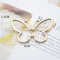 Elegant gold-tone butterfly metal hair clip in alloy, size 6cm with back view structure - Butterfly Shape Gold