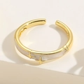 Detailed view of adjustable gold star ring with white enamel and sparkling zircon accents - Star Enamel Ring / Gold