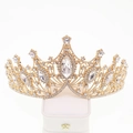 Baroque gold bridal crown with crystal rhinestones on a white jewelry display box - Standard V-shape Gold Crown