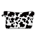 Trapezoidal makeup bag with black and white cow print and sturdy zipper closure - Cow Print