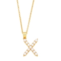 Detailed view of gold X-shaped pendant necklace featuring inlaid white imitation pearls - Letter X