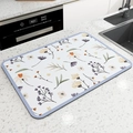 Absorbent diatomite kitchen mat with floral pattern and blue reinforced edges - Purple Flower