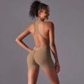 Detail of cross-back yoga bodysuit showing high-elasticity fabric and ruched peach butt lifting - S / Top And Bottom / Cocoa