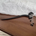 New Chinese style black hair pin with silver metal hollow floral pattern and tassels - Seven Black Beads