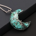 Detailed wire-wrapped silver tree of life inside a turquoise stone moon pendant necklace - Turquoise Moon - Silver Twist Chain