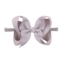 Grey nylon baby headband featuring a large ribbed fabric bow for children and infants - Gray