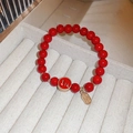 Handwoven red bead bracelet with gold-plated charms featuring lucky Chinese characters - Style 90 Number (Fortune 12)