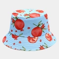 Close-up of sky blue bucket hat featuring vibrant watercolor pomegranate patterns and stitching - Sky Blue Base Pomegranate Print (18# Color)