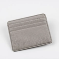 Slim grey lychee grain leather card holder with three slots and minimalist stitching - Off-White