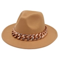 Close-up of camel felt fedora hat featuring a chunky rose gold acrylic chain decoration - Camel