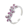 Macro shot of silver ear cuff with five pink flower gems on a bright white background - Platinum Plated Rose Red Zirconia