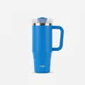 Detail view of a 40oz insulated stainless steel tumbler with handle and straw in bright blue - Klein Blue