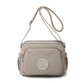 Waterproof nylon crossbody bag for women in beige with multiple zipper pockets - Milk Tea