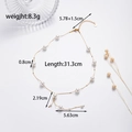 Collana elegante in titanio dorato con perle bianche e nappe, lunghezza 31,3 cm, peso 8,3 g - Collana di perle dorate / Oro