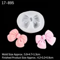 Bowknot silicone mold for chocolate with pink finished pieces and size dimensions - 17-895 Bowknot / Clear