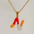 Golden balloon style letter N pendant necklace with vibrant multi-color enamel finish - Red Orange Pink Enamel Letter N