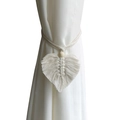 Handmade macrame curtain tieback in off-white with a leaf pattern and wooden bead - White