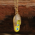 Gold flip-flop pendant necklace with neon green finish and blue evil eye charms - Yellow Evil Eye