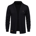 Dettaglio macro del tessuto del cardigan nero in maglia e della tasca laterale - S / Nero