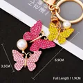 Colorful crystal butterfly keychain with pink and yellow rhinestones on gold alloy - Three Butterflies Pink Yellow