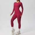Detail of berry red yoga set featuring high-waist leggings with practical side pockets - S / Top And Bottom / Carmine