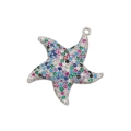 Macro shot of silver starfish pendant set with colorful zircons and crystal stones - White Gold Multicolor