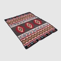 Detail view of Southwestern style flannel blanket featuring ethnic geometric patterns - Navajo Tribal Style