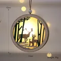 Luminous wooden reindeer ornament with forest silhouette and warm LED light, 12cm x 11cm - Green Elk