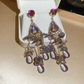 Close-up of vintage crystal tassel earrings with purple gems and golden finish - 25# Silver Pin Gold Vintage Purple Crystal Tassel