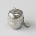 Detailed macro view of 304 stainless steel tea infuser ball with fine mesh and metal chain - Small Ball