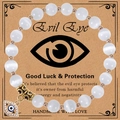 Handmade 8mm white zebra stone bracelet featuring a crystal evil eye charm for good luck - Cat-eye Stone Bracelet