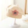 Detailed knit texture of beige baby beret featuring a cute pink crochet flower embellishment - 3-48 Months / Beige