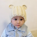 Close-up of baby beige knitted hat with bear ears and warm thick wool material - Beige Panda - Not Lined