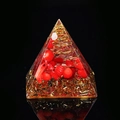 Orgone energy pyramid with red coral stones and copper coil in clear resin - Red Coral Stone