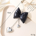 Black bow charm with silver heart pendants and chains for bags and phone cases - Cord End Leather Heart Bow / Black