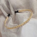 Golden twisted chain headband with black fabric tips on a beige mesh fabric background - 9# Large Alloy Chain Headband