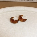 Macro shot of tortoiseshell C-shape resin earrings on a beige linen tray - 33# Silver Needle - Brown - Thick C-Hoop