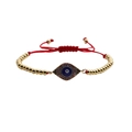 Verstellbares rotes Evil Eye Armband mit Goldperlen und funkelnden blauen Strasssteinen - Rotes Seil mit goldenen Kupferperlen
