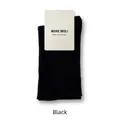 Women's black cotton mid-calf socks with packaging card on white background - Black