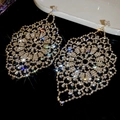 Macro shot of sparkling rhinestone encrusted mesh dangle earrings with diamond-like shine - 41-Silver Pin-Gold-Hollow Mesh Design