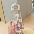 Detailed view of Capybara straw cup with cute floral patterns and one-button lock lid - 600ml / LF-2028 White (Rabbit)