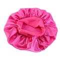 Detailed top view of bright pink satin sleep cap with elastic wide band and silky texture - One Size / Rose Red