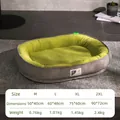 Size chart for oval plush pet bed with green fleece lining and grey corduroy edges - Green