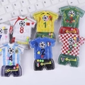 Football jersey style handheld marble maze puzzle toy in various national team designs - Jersey Maze