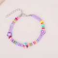 Buntes handgefertigtes Boho-Perlenarmband mit Sternen und Herzen für Damen - Lila