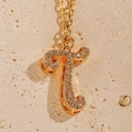 Minimalist 18K gold plated necklace featuring a sparkling letter T pendant with pavé crystals - Letter T
