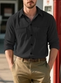 Detail of black corduroy shirt showing vertical ribbed texture and double chest pockets - S / Black