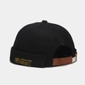 Street style black cotton docker cap with golden label and brown leather strap back - Adjustable / Black