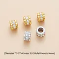 Macro shot of brass barrel beads with inlaid zircon and a 4mm hole for DIY jewelry - Three-Row Channel Set Barrel Style (TPJ1112-White Zirconia) / Gold