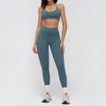 Two-piece slate blue yoga set featuring a halter sports bra and high-waisted leggings - 3109 Bra + 8863 Pants - Cosmic Blue